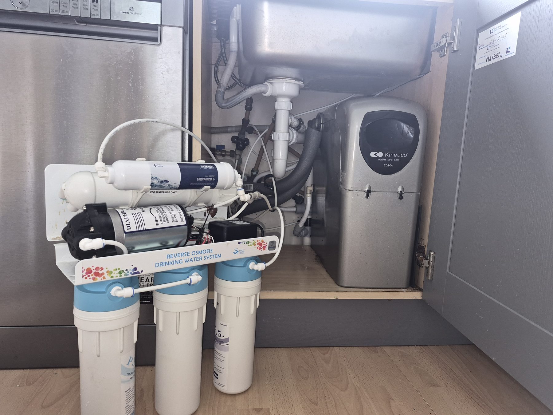 Reverse osmosis drinking water system installed under a kitchen sink